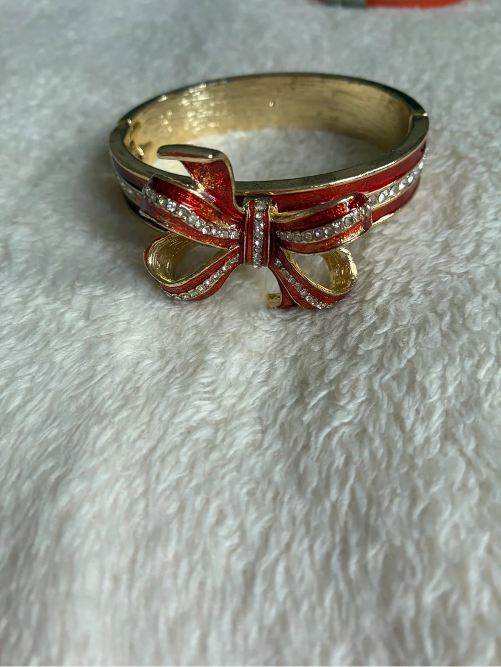 Gold-Tone Red Bow Bangle Bracelet with Crystal Accents